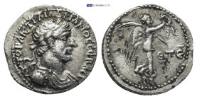 Cappadocia, Caesarea. Hadrian. AR, Hemidrachm. 1.8 Gr. 15mm.
Laureate, draped and cuirassed bust of Hadrian. 
 Rev. Victory advancing to right, holdin...