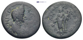 Caria. Attuda. Domitia AD 82-96. Bronze Æ 6.83 Gr. 22mm.
Draped bust of Domitia, right
Rev.Dionysus standing facing, head left, draped legs, holding c...