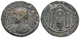 MESOPOTAMIA, Nisibis. Philip II. 247-249 AD. AE. 8.05 Gr. 25mm.
Radiate and cuirassed bust left 
Rev. tetrastyle temple; statue of Tyche within, ram a...