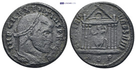 Maxentius. A.D. 306-312. AE follis Rome 7.1 gr. 25mm. 
Laureate head right 
Rev. Roma seated facing, head left, in hexastyle temple, globe in her righ...