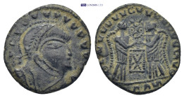 Barbaric issue, imitating Constantine I, c. 5th century AD. 2.19 Gr. 17mm.
 Laureate, helmeted and cuirassed bust right. 
 Rev. Two Victories standing...