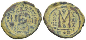 Justinian I (527-565). Æ 40 Nummi (33mm, 16.11g). Constantinople, year 31 (557/8). Cuirassed and helmeted bust facing. R/ Large M; A/CON.