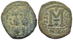 Justin II and Sophia (565-578). Æ 40 Nummi (28mm, 12.7 g). Constantinople, year 8 (572/3). Nimbate figures of Justin and Sophia seated facing on doubl...