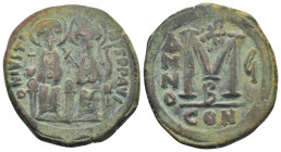 Justin II and Sophia (565-578). AE 40 Nummi. Constantinople, (31mm, 16.0 g) Nimbate figures of Justin and Sophia seated facing on double throne, holdi...