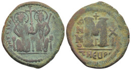 Justin II, with Sophia. 565-578. Æ follis. (31mm, 15.3 g) Theoupolis (Antioch) mint, 3rd officina. Justin and Sophia seated facing on double throne, e...