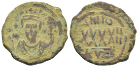 Phocas (602-610) AE Follis (29mm, 10.43 g) Cyzicus, Dated RY 4 (605/6 AD). Obv: dN FOCAS PERP AV, crowned facing bust, wearing consular garb, holding ...