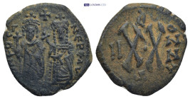 Phocas, with Leontia. 602-610. AE Half Follis 4.54 Gr. 19mm. Theoupolis (Antioch) mint. Dated RY 2 (AD 603/4). Phocas and Leontia standing facing; cro...