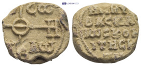 Byzantine Lead Seal (16.55 Gr. 23mm.). Obv: Cruciform monogram Rev: Legends in four lines.