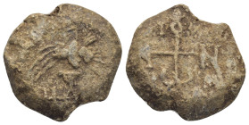 Byzantine Lead Seal (22mm, 13.77 g) Obv: Victory advancing left. Rev: Cruciform monogram.