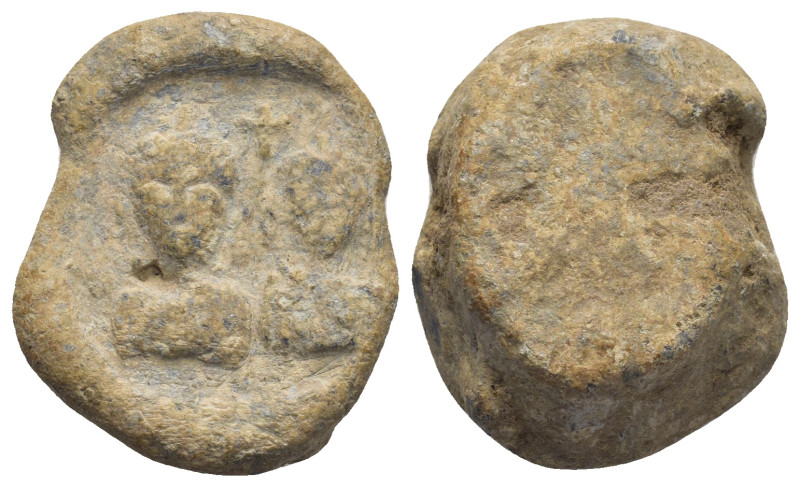 Byzantine Lead Seal (22mm, 21.6 g) Obv: Two draped male busts facing; between th...