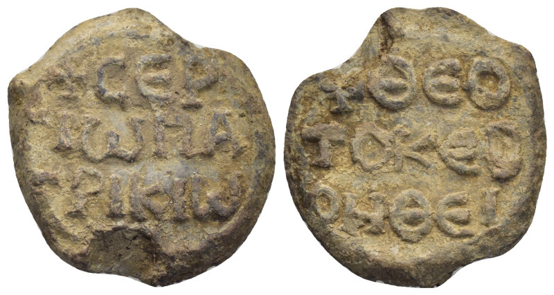 Byzantine Lead Seal (23mm, 10.90 g) Obv: Legends in three lines. Rev: Legends in...