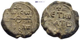 Byzantine Lead Seal (28mm, 15.4 g) Obv: Cruciform monogram Rev: Legends in three lines.