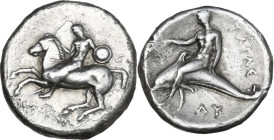Greek Italy. Southern Apulia, Tarentum. AR Nomos, 302-280 BC. Obv. Horseman left, holding round shield. Rev. Phalanthos riding on dolphin left, holdin...