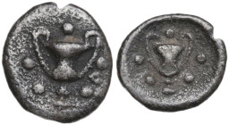 Greek Italy. Southern Apulia, Tarentum. AR Obol, 280-228 BC. Obv. Kantharos surrounded by five pellets. Rev. Kantharos surrounded by five pellets. HN ...