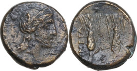 Greek Italy. Southern Lucania, Metapontum. AE 17 mm, late 3rd century BC. Obv. Head of Demeter right, wearing wreath of grain. Rev. Two ears of barely...
