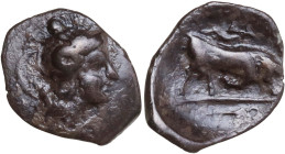 Greek Italy. Southern Lucania, Thurium. AR Triobol, 300-280 BC. Obv. Head of Athena right, wearing helmet decorated with Scylla. Rev. Bull butting rig...