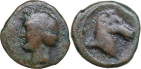 Greek Italy. Bruttium, Locri Epizephyrii. Punic Occupation. AE 20 mm, c. 215 - 205 BC. Obv. Head of Tanit left, wearing wreath of grain. Rev. Horse he...