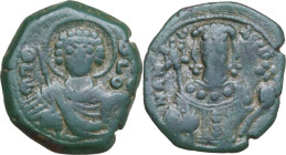 Manuel I Comnenus (1143-1180). AE Tetarteron, uncertain mint. Obv. Nimbate bust of St. George facing, holding spear and shield. Rev. Crowned bust of M...