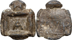 Lead weight. Roman-Hellenistic, 1st-2nd centuries AD. D/ Large A. R/ L(?). V. P. PB. 26.80 g. 35 x 31.5 mm. Eastern square weight with rounded tab at ...