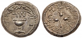 Judaea, The Jewish War. Silver 1/2 Shekel (6.44 g), 66-70 CE. Jerusalem, year 3 (68/9 CE). 'Half of a shekel' (Paleo-Hebrew), ritual chalice with pear...