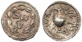Judaea, Bar Kokhba Revolt. Silver Zuz (3.08 g), 132-135 CE. Year 2 (133/4 CE). 'Sm' (Paleo-Hebrew) within wreath of thin branches wrapped around eight...