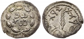Judaea, Bar Kokhba Revolt. Silver Zuz (3.33 g), 132-135 CE. Undated, attributed to year 3 (134/5 CE). 'Shim'on', in two lines within a wreath of thin ...