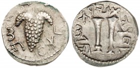 Judaea, Bar Kokhba Revolt. Silver Zuz (3.45 g), 132-135 CE. Undated, attributed to year 3 (134/5 CE). 'Simon' (Paleo-Hebrew), bunch of grapes with lea...