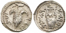 Judaea, Bar Kokhba Revolt. Silver Zuz (3.39 g), 132-135 CE. Undated, attributed to year 3 (134/5 CE). 'Simon' (Paleo-Hebrew), bunch of grapes with lea...