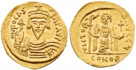 Focas (A.D. 602-610). Gold Solidus (4.44 g, 7h). Mint of Constantinople. ON FOCAS PERP AVG, crowned, draped and cuirassed bust facing, holding a globu...