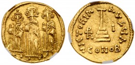 Arab-Byzantine. Anonymous ( temp. Mu'awiya b. Abi Sufyan or 'Abd al-Malik b. Marwan). Gold Solidus (4.34 g), AH 41-60 or 65-86. De-Christianized type ...