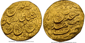 Qajar. Nasir al-Din Shah (AH 1264-1313 / AD 1848-1896) gold Toman ND Clipped NGC, Mashhad-i Muqaddas, A-2921. 2.69gm. From the Dynasty Collection, #30...