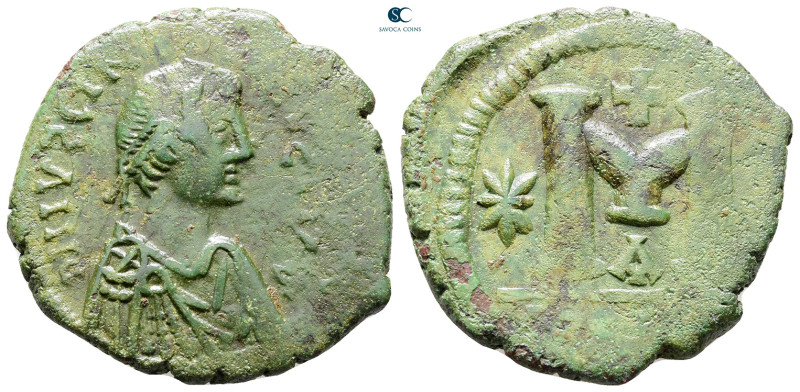 Justinian I AD 527-565. Theoupolis (Antioch)
Follis or 40 Nummi Æ

31 mm, 13,...