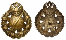 BADGES
Badge of the Latvian Rifle Battalions. P/B 4.4.20. Brass. Eight-rayed star with legend Л.C.Б – L.S.B. on wreath. Screwback, maker on plate: “O...
