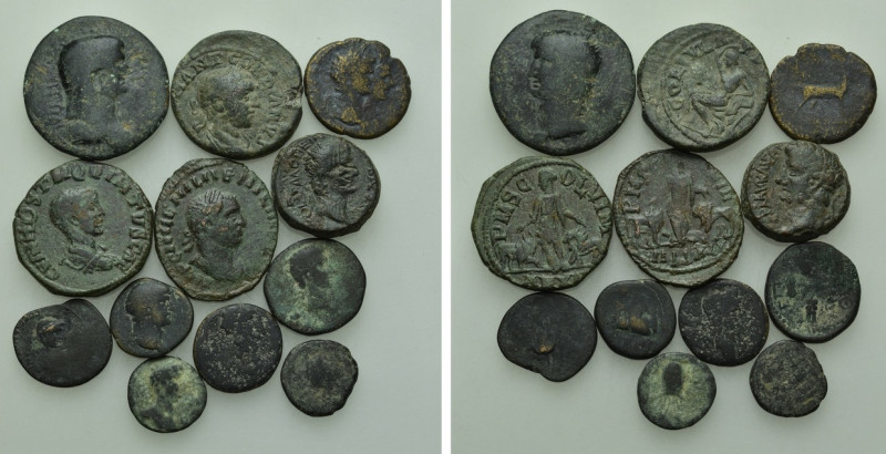 12 Roman Provincial Coins. 

Obv: .
Rev: .

. 

Condition: See picture.
...