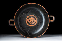 GREEK ATTIC BLACK-FIGURED KYLIX WITH GORGON

 Ca. 500 BC
 A beautiful black-figured kylix, attributed to the Leafless group. The frontal face of a ...