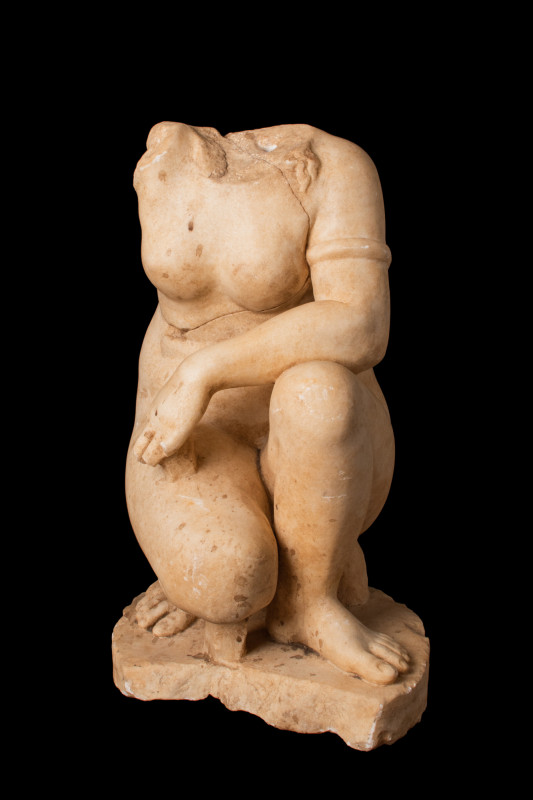 ROMAN MARBLE CROUCHING VENUS STATUE

Possibly Roman, Ca. AD 200
A Roman marbl...