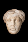 ROMAN MARBLE HEAD OF A FEMALE

Ca. AD 200
A marble head of a woman with idealised, youthful features. Her oval face gently tapers to a pronounced c...