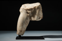 ROMAN MARBLE FRAGMENTARY LEGS OF A NUDE YOUTH

 Ca. 1st-2nd Century AD
 A fragmentary Roman marble statue, depicting the buttocks and legs of a mal...