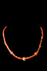 ROMAN GOLD AND CARNELIAN NECKLACE

 Ca. AD 1-300
 A restrung necklace composed of an interweaving pattern of long, cylindrical carnelian beads and ...