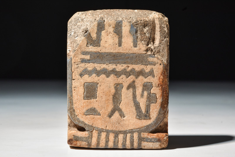 AN EGYPTIAN FAIENCE TILE WITH CARTOUCHE OF PHARAOH SETI II

 New Kingdom, 19th...