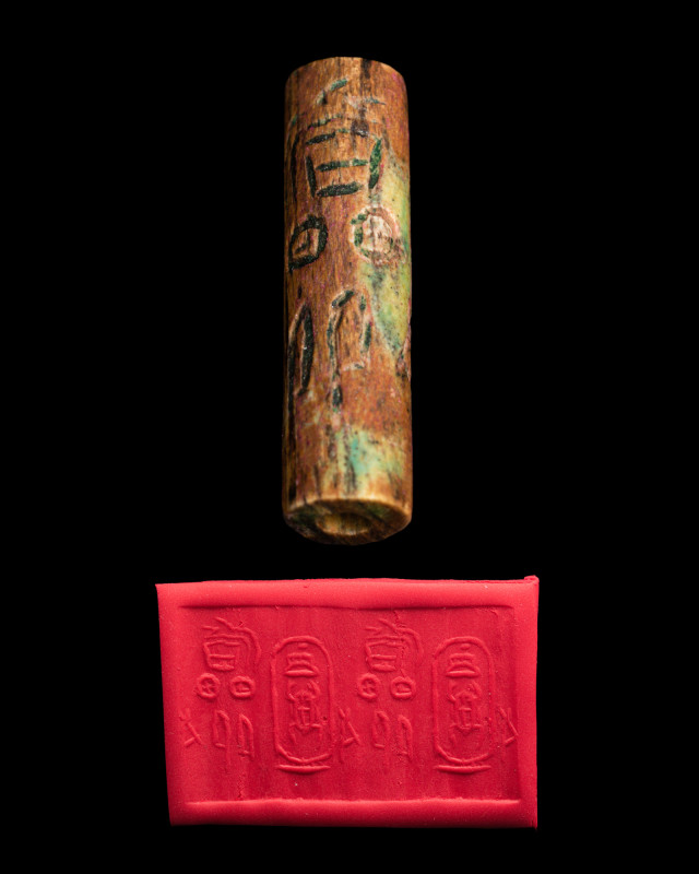 EGYPTIAN GLAZED STEATITE CYLINDER SEAL FOR SENUSRET III

 Middle Kingdom, Ca. ...