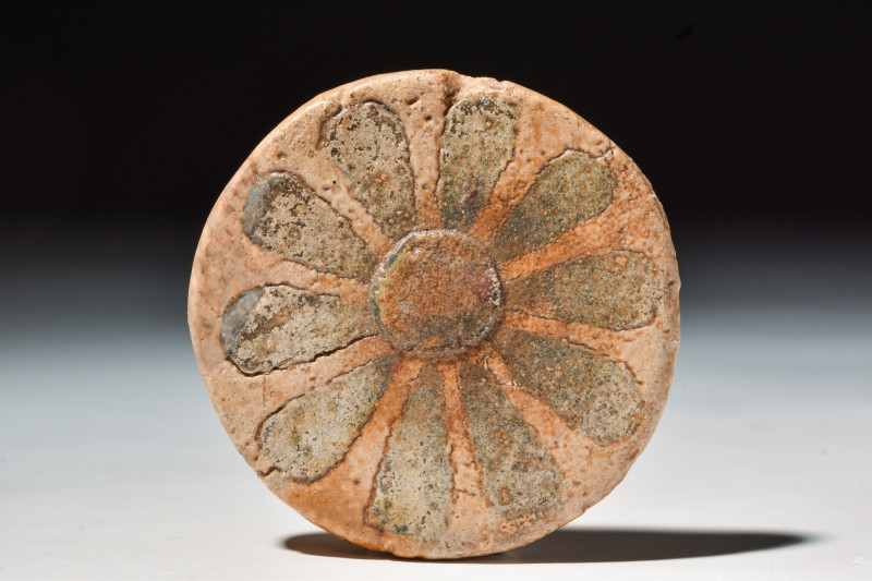 EGYPTIAN FAIENCE ROSETTE INLAY

 New Kingdom, 20th Dynasty, Ca. 1184 - 1153 BC...