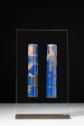 TEN EGYPTIAN LAPIS LAZULI HALF CYLINDER INLAYS

 New Kingdom, Ca. 1550 - 1070 BC
 A group of ten inlays displaying a vibrant cobalt blue glaze. The...