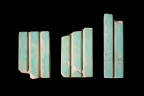 EGYPTIAN FAIENCE DJOSER WALL TILES 

 Old Kingdom, Ca. 2630 - 2611 BC 
 A set of three faience wall tiles, the left one is a famous type found on t...