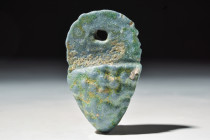 EGYPTIAN BLUE GLAZED FAIENCE GRAPE CLUSTER

 New Kingdom, Ca. 1550 - 1069 BC
 An example of a moulded pendant grape cluster. The piercing at the to...