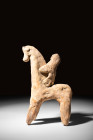 PARTHIAN TERRACOTTA HORSEMAN

 Ca. 2nd century BC
 A terracotta figurine of a horseman. The rider is depicted with arms extended forward, grasping ...