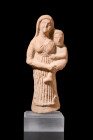 PARTHIAN TERRACOTTA MOTHER GODDESS HOLDING CHILD

 Ca. 600 BC
 A hollow terracotta figure of a mother goddess holding a child in her arms. The godd...