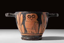 ATTIC RED FIGURE OWL SKYPHOS

 Ca. 5th century BC
 A red-figure skyphos, characterised by a base ring supporting a deep cup with two horizontally p...