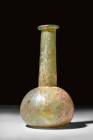 ROMAN GLASS FLASK

 Ca. AD 1-300 
 A Roman bottle blown from green glass. The vessel features an apple-shaped body with a concave base, a long cyli...