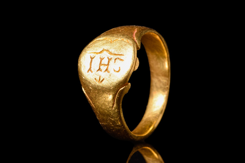 MEDIEVAL GOLD RING INSCRIBED WITH 'IHS' MONOGRAM

 Western Europe, Ca. AD 1500...